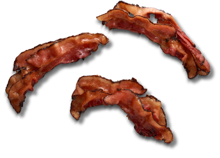three pieces of bacon on a black background
